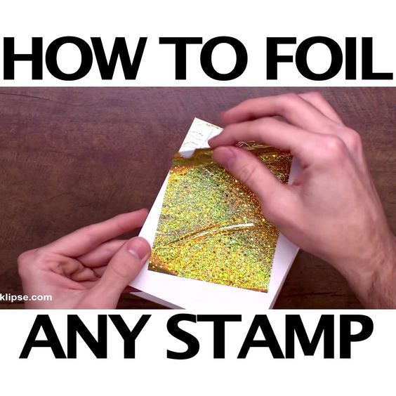 someone is making an art project with gold glitter on paper and white envelopes that read, how to fold any stamp