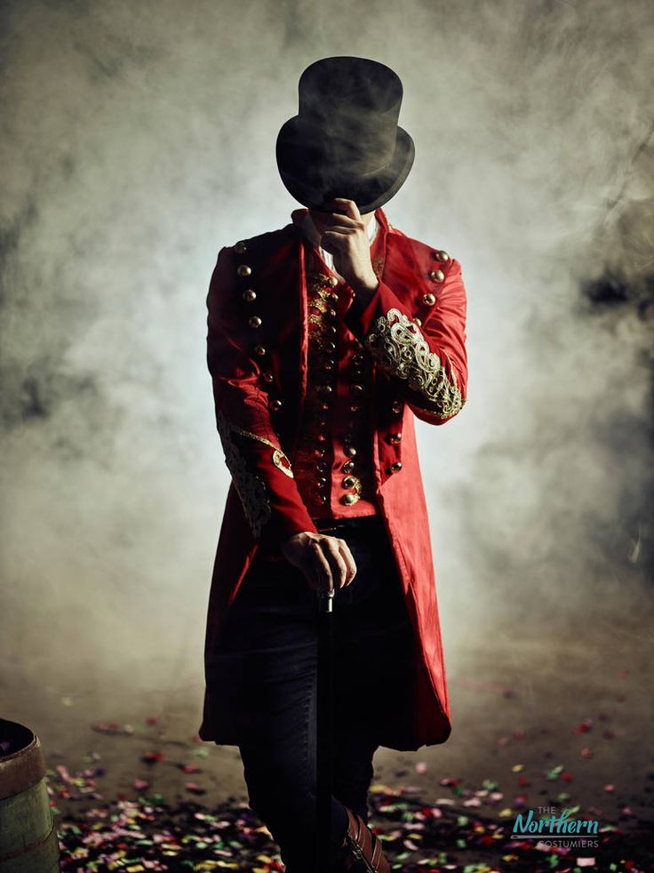 a man in a red coat and top hat