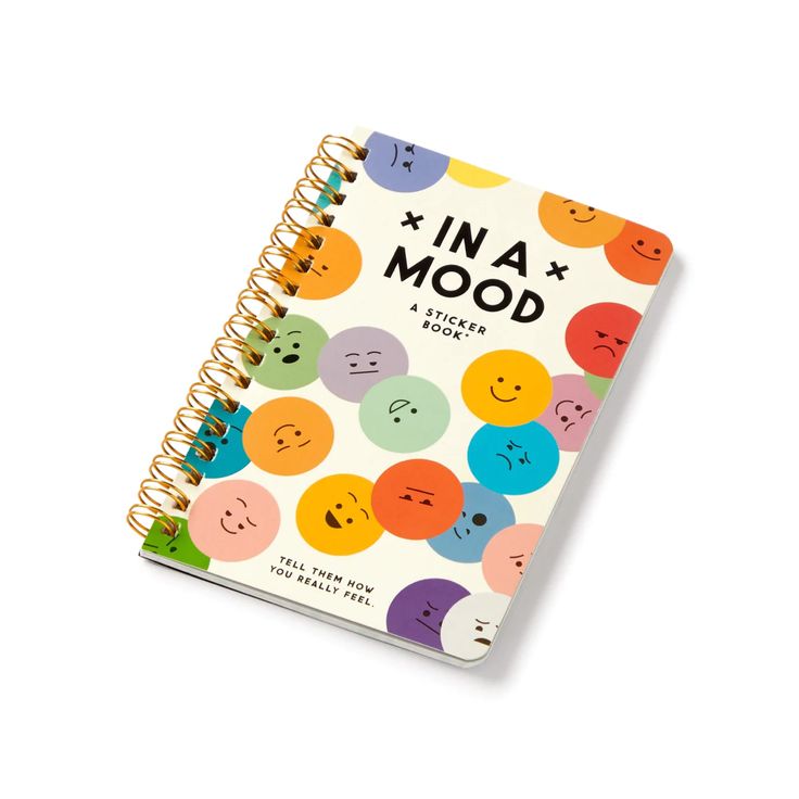 an in a mood notebook with smiley faces on it