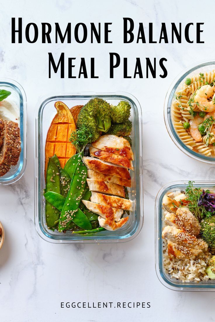 four glass containers filled with food on top of a marble countertop, and the words homemade balance meal plans