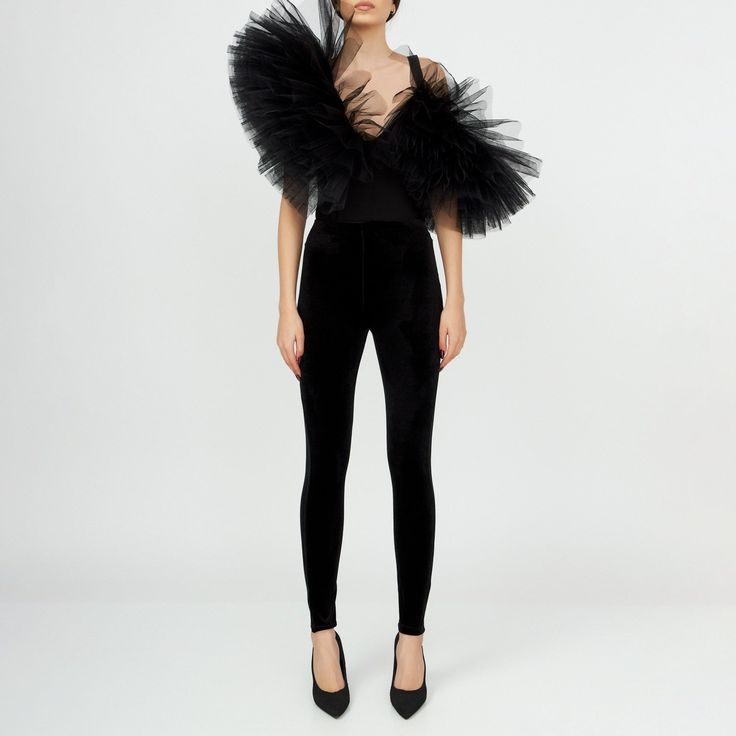 A fusion of contemporary and classic, this innovative bodysuit strikes the balance between bold and sophisticated, making it a show-stopping addition to any ensemble. The asymmetrical design adds a touch of avant-garde sophistication, while the whimsical tulle ruffles exude a playful charm, adding an artistic flair to the aesthetic. Intricate detailing showcases craftsmanship, giving this bodysuit a refined touch that's sure to turn heads. Perfect for special occasions or as a daring accent to y Ruffle Jumpsuit, Ruffle Bodysuit, Velvet Trousers, Brand Magazine, Stocking Fillers For Her, Velvet Leggings, Whimsical Fashion, Avant Garde Fashion, Feminine Aesthetic