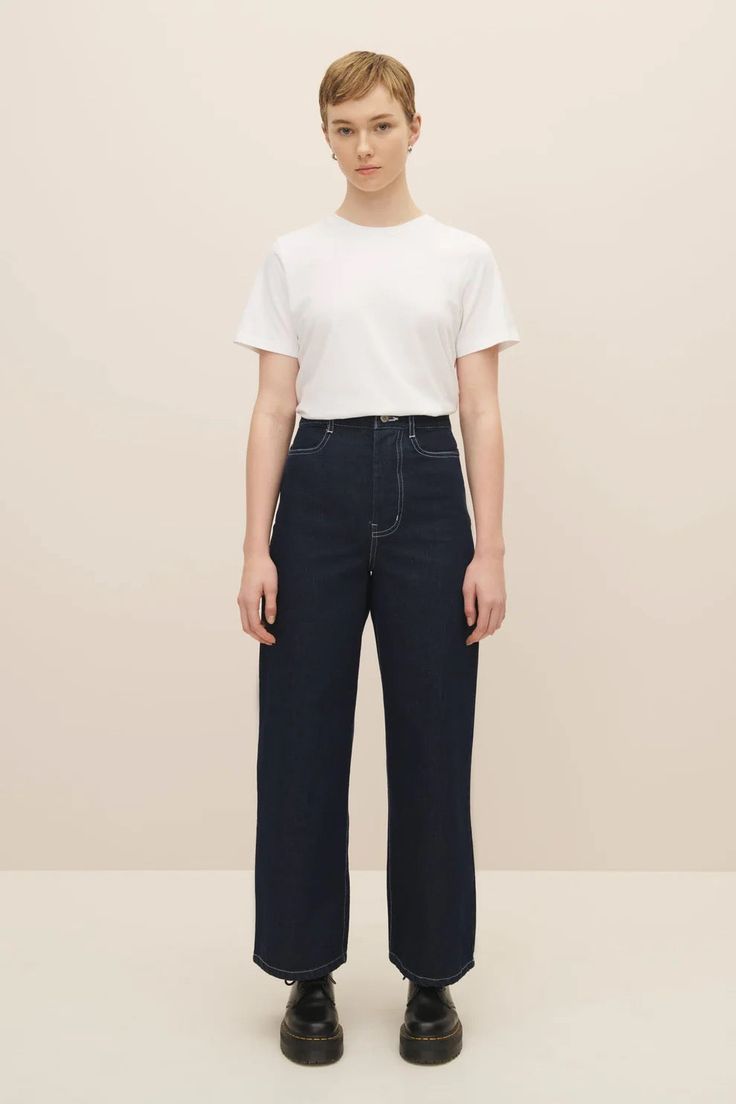 Sailor Jeans in Indigo Denim designed by Kowtow. Crafted from heavyweight organic cotton denim. These high-rise jeans feature a straight, wide leg, fixed waistband, and button fly, with front and back pockets. Made with 100% Fairtrade organic cotton and plastic-free materials. Sizing + Details → Made In New Zealand 100% Certified Fairtrade Organic Cotton Plastic-Free Fits True To Size Designed To Sit High On The Waist, With A Standard Fit Pre-Washed, Fabric Will Relax With Wear Sailor Jeans, Sailor Jean, High Rise Style, Indigo Denim, Garment Labels, Denim Design, Wide Leg Denim, High Rise Jeans, Jeans For Sale