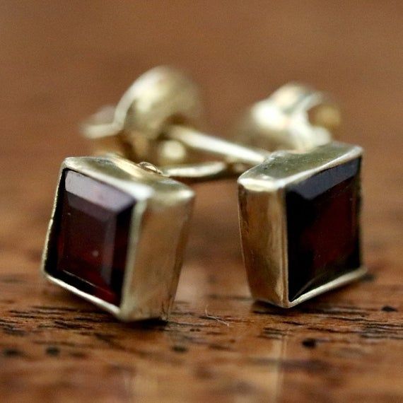 You can't go wrong with a classic. Gaining popularity in Edwardian times, wear these simple square studs when subtle sophistication is required. Available with faceted garnet or cabochon lapis. 24k gold vermeil. Size: 1/4" Garnet Earrings, Square Stud, Rhodolite Garnet, Moonstone Necklace, Pretty Earrings, Gold Enamel, Accessories Jewelry Earrings, Hand Made Jewelry, Conflict Free Diamonds