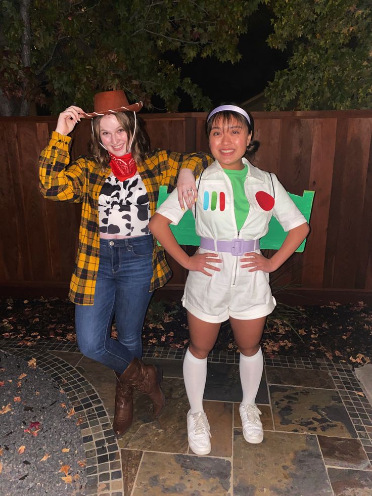 two girls dressed up as toy story characters