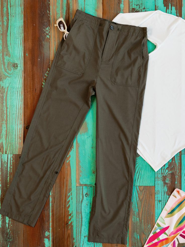 Introducing our quick-dry Travel Pant with drawstring closure and adjustable length – the ultimate companion for your adventures near and far! Whether you're running through the airport, trekking through the wilderness, or simply seeking comfort, these versatile pants are designed to keep you stylish while on the move. Quick-Dry | Our travel pants are crafted from a moisture-wicking fabric that ensures you stay dry and comfortable. Closure | The drawstring closure at the waist with a zipper fly Summer Utility Parachute Pants For Outdoor Activities, Functional Summer Cargo Hiking Pants, Functional Summer Cargo Pants For Hiking, Functional Summer Hiking Cargo Pants, Summer Hiking Pants With Cargo Pockets, Summer Outdoor Parachute Pants Straight Leg, Summer Outdoor Straight Leg Parachute Pants, Straight Leg Parachute Pants For Summer Outdoor, Relaxed Fit Hiking Pants With Pockets