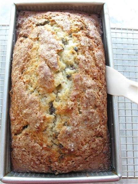 a loaf of bread sitting on top of a cooling rack