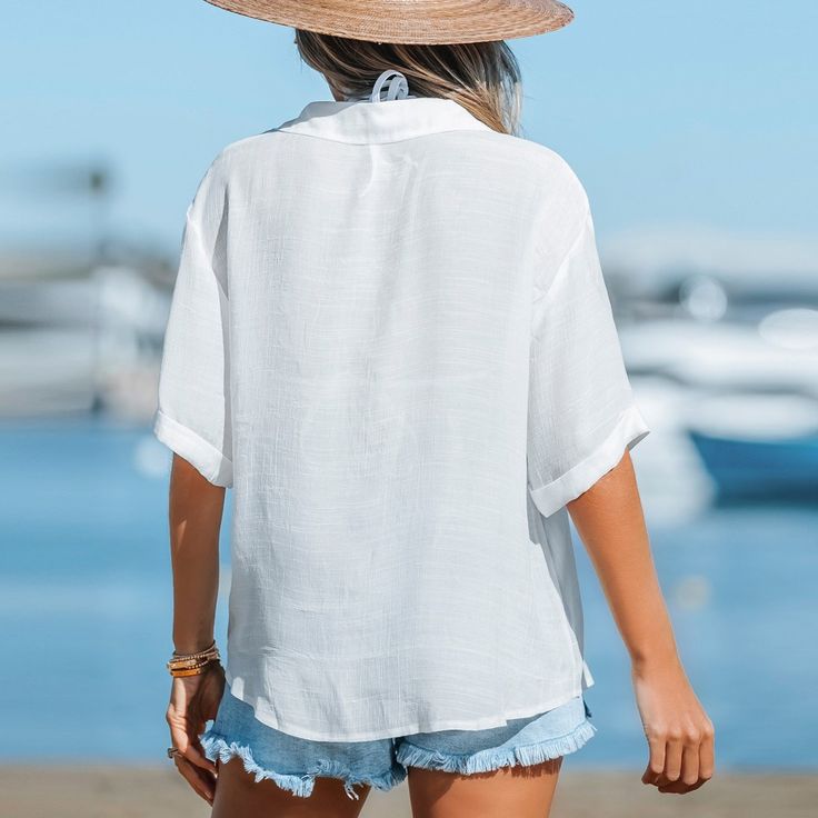 Have some fun in the sun in this semi-sheer cover-up shirt featuring a V-neckline, basic collar, button-front closures, and short sleeves with rolled cuffs. Crafted from a semi-sheer fabric, this cover-up shirt offers a lightweight and breathable feel, ideal for hot summer days. The semi-sheer quality adds a hint of allure and allows for a peekaboo effect, showcasing your swimsuit underneath. Product code:CAA07A3B003CC/CAA07A3B003GG/CAA07A3B003SS/CAA07A3B003UU Model Wearing Size: S Height:5‘6" i Summer V-neck Shirt For Vacation, Solid Color Short Sleeve Shirt With Buttons For Summer, White Half Sleeve Summer Shirt, White Half Sleeve Shirt For Summer, V-neck Shirt For Summer Vacation, Solid Short Sleeve Shirt With Buttons For Summer, Collared Shirt For Summer Vacation, Button-up Short Sleeve Beach Shirt, Collared Shirt With Button Closure For Beach