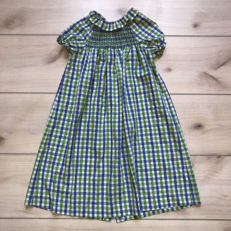 Orient Express Blue & Green Gingham Smocked Dress. Size 4. Buttons down the back. Lightweight cotton. Excellent Used Condition Smocked Bishop Dress, Green Gingham, Orient Express, Smocked Dress, Smocking, Gingham, Swirl, Blue Green, Size 4