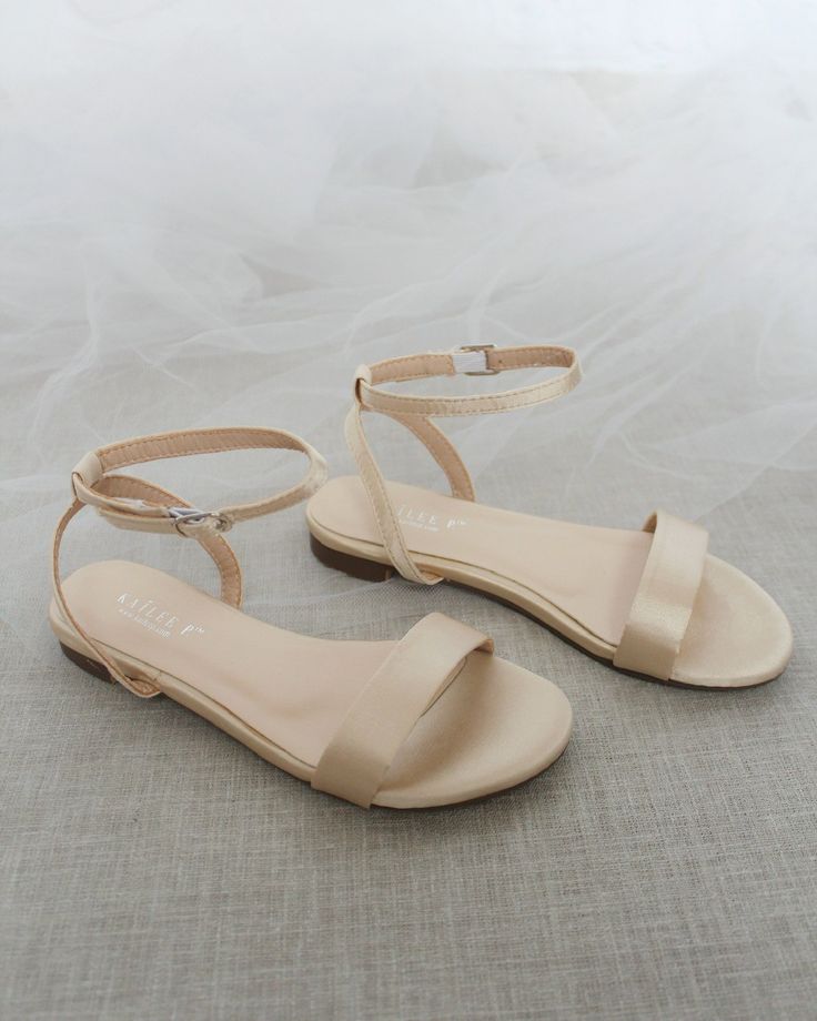 Classy satin flat sandals with ankle strap. Effortless yet adorable to wear on your favorite occasion. Can be pair with dress or casual look.DETAILS:COLORS AVAILABLE: Ivory, White, Pink, Light Blue, and ChampagneUPPER: Synthetic upper and liningMATERIALS: Mandmade outsoleSTYLE NAME: MADDY Champagne Shoes Wedding, Prom Flats, Bridesmaid Shoes Flat, Bridesmaid Flats, Bridesmaid Sandals, Champagne Shoes, Shoes For Brides, Birthday Party Princess, Bridesmaids Shoes