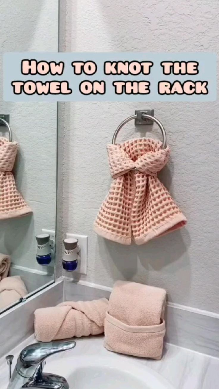 a bathroom sink with towels hanging on the wall and a mirror above it that says, how to knott the towel on the rack