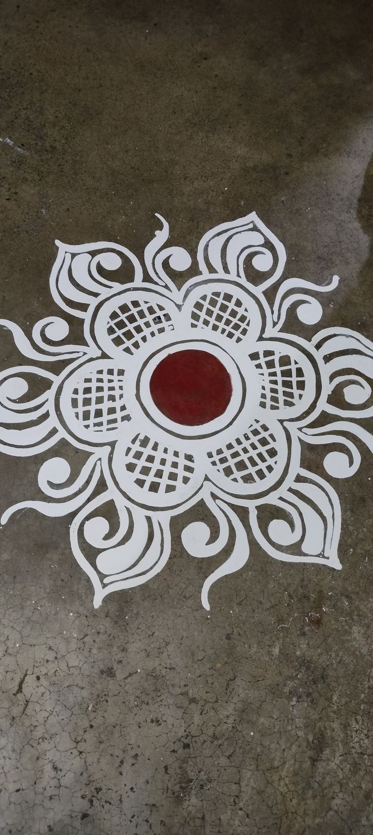 a white and red design on the ground