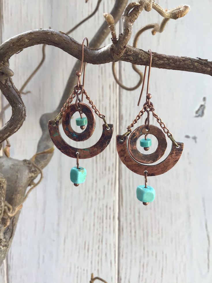 Hammered copper washers with copper wire, turquoise beads and copper chain. Copper Dangle Earrings With Patina, Copper Dangle Jewelry With Patina, Bohemian Jewelry In Copper Wire With Patina, Nickel-free Turquoise Copper Jewelry, Rust Copper Dangle Earrings, Rust Copper Dangle Jewelry, Turquoise Copper Dangle Jewelry, Rust Colored Copper Dangle Jewelry, Rust-colored Copper Dangle Jewelry