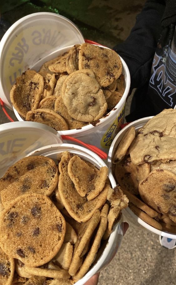 three buckets filled with chocolate chip cookies