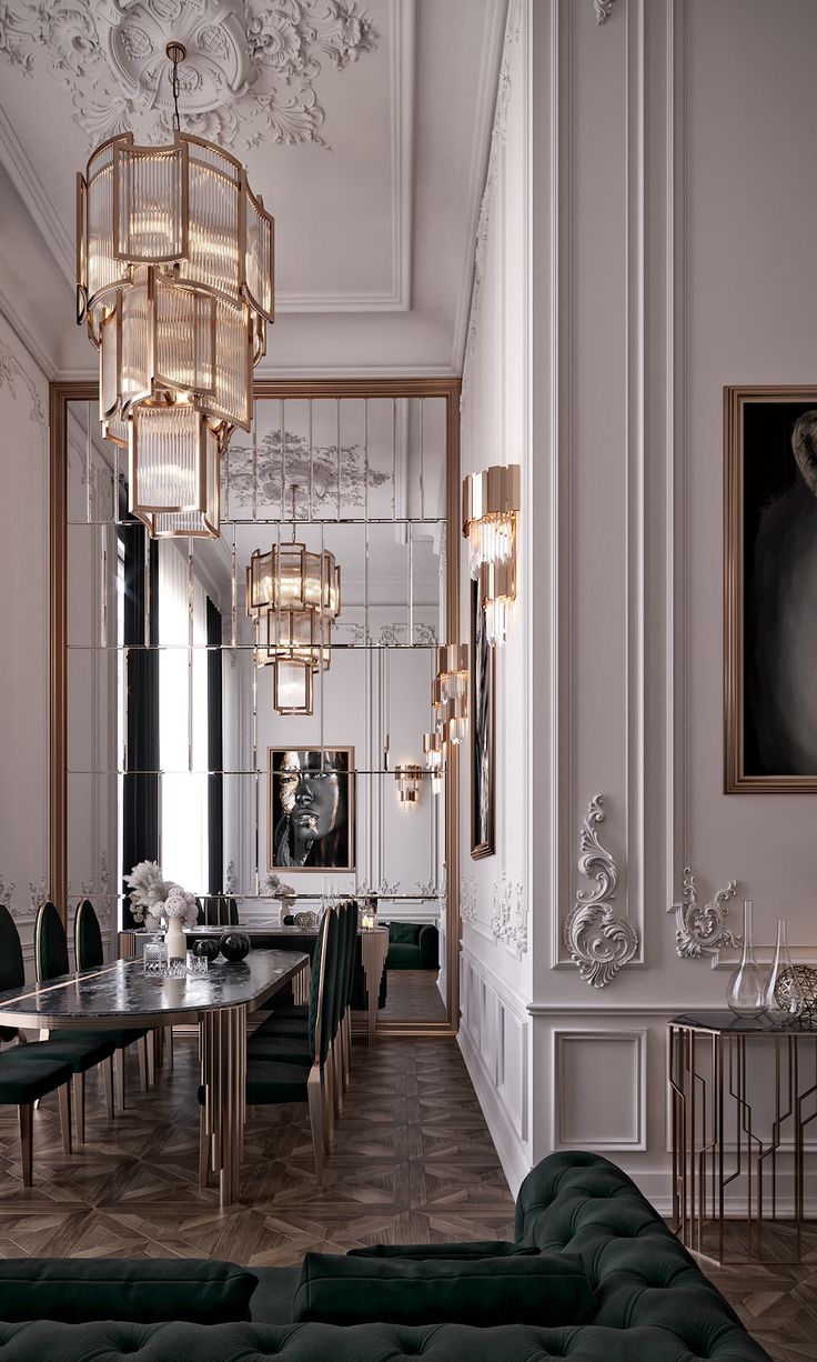 an elegant dining room with chandeliers and art deco decor on the walls, along with black velvet couches