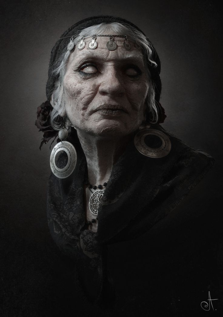 an old woman with white hair and piercings on her head, wearing ear rings