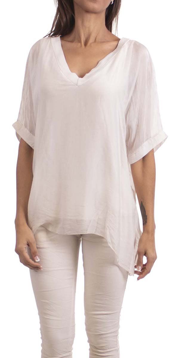 Gentle flowing pure silk, double V-neck silk blouse. Short sleeve finished with wide double-layer hem. Exterior 100% Silk | Interior 95% Viscose, 5% Elastic Model 5'8" One Size Made in Italy Versatile V-neck Viscose Blouse, Flowy Viscose Tunic, Elegant Silk V-neck Tunic, Versatile Silk V-neck Top, Silk V-neck Top, Flowy Solid V-neck Blouse, Flowy Solid Color V-neck Blouse, Flowy V-neck Blouse, Solid Color Flowy V-neck Blouse