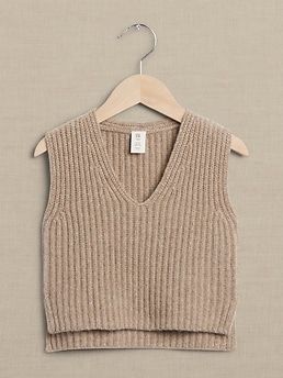 Layer baby in luxury with this delicate little wonder, crafted from a lavish blend of plush cashmere that pairs ever so sweetly with long sleeve t-shirts and cashmere pants.  SUSTAINABILITY: This 100% cashmere garment is made with 50% recycled cashme Brown Sweater Vest, Cashmere Pants, Baby Knitwear, Brown Sweater, Baby Sweaters, Baby Clothes Shops, Cashmere Sweater, Matching Outfits, Sweater Vest