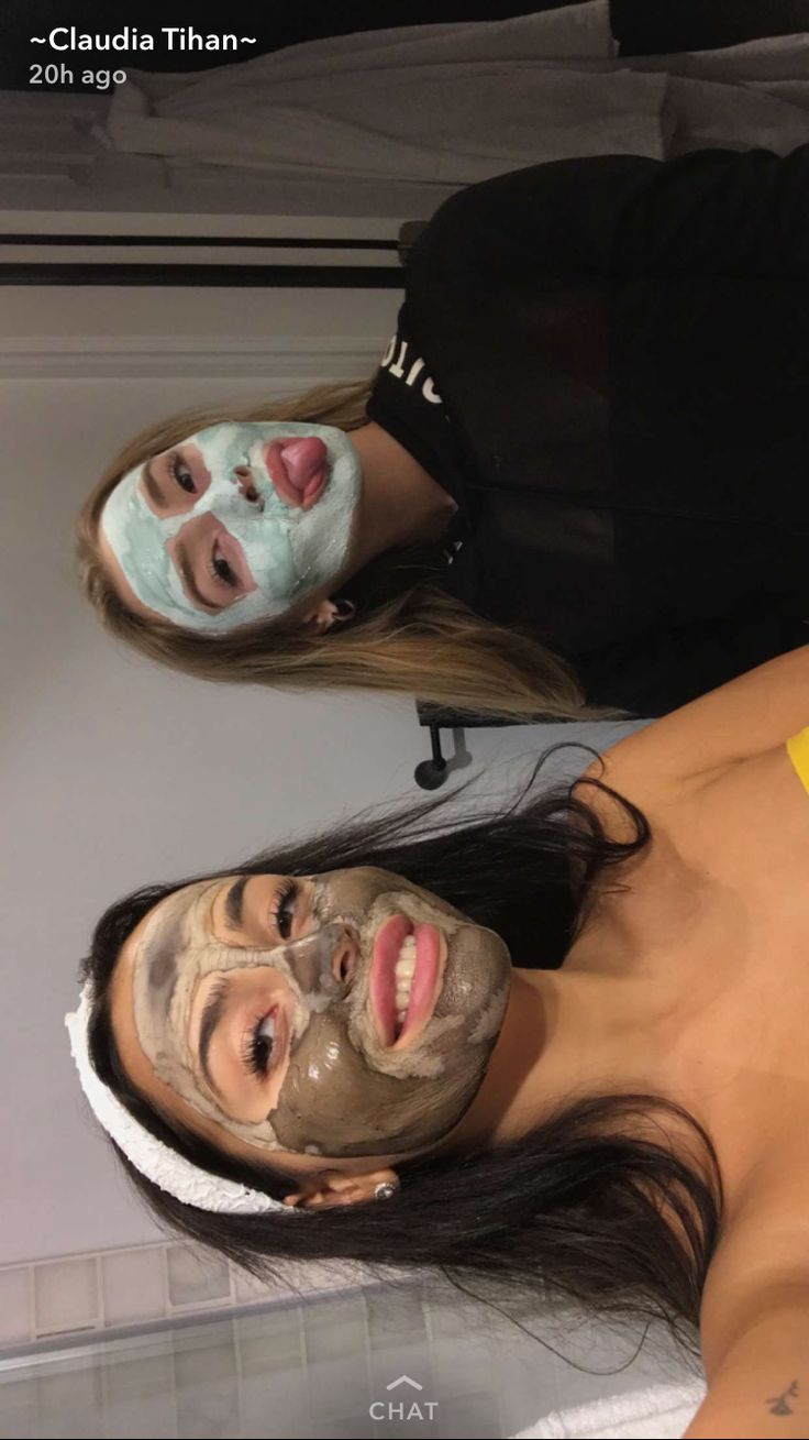 two women with facial masks on their faces