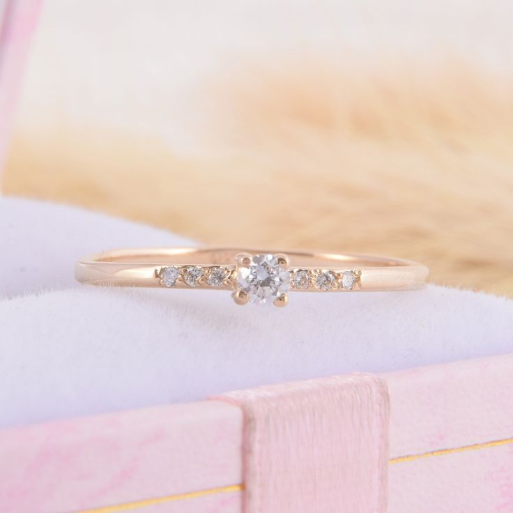 Small & dainty 14k yellow gold promise ring for her, Unique delicate minimalist womens promise ring, Small tiny gold cz engagement ring WE OFFER UNLIMITED PERIOD INSTALLMENTS PLAN This is a beautiful, stunning, feminine ring that works well for all occasions, styles, and ages. You will love it! Ring information: Main stone: White cubic zirconia Approximate size: 2.5mm Accent stones: Cubic zirconia Approximate size: 1.0mm (6 stones) Metal type: Gold Metal stamp: 14k Gold Installment Payments Dainty Stackable Rings For Promise, Delicate Jewelry With Diamond Accents For Promise Ring, Dainty Cubic Zirconia Birthstone Ring With Prong Setting, Diamond Midi Rings For Promise, Round Cut, Dainty 14k Rose Gold Diamond Ring For Anniversary, Delicate 14k Gold Midi Rings For Promise, Diamond Midi Promise Ring With Round Cut, Delicate Round Cut Diamond Ring For Promise, Dainty Diamond Midi Rings With Round Cut