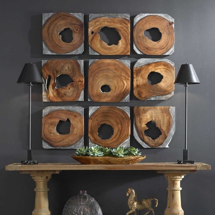 a wooden table topped with lots of different pieces of wood on top of each other