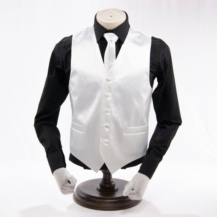 Rich color adds a stylish edge to this attractive vest featuring crisp satin microfiber and an easily adjustable strap for versatility. Classic Fitted White Vest, Fitted White Classic Vest, Classic White Fitted Vest, White Fitted Formal Vest, Classic White Work Vest, Classic White Workwear Vest, White Fitted Vest For Formal Occasions, Elegant Fitted White Vest, White Formal Vest For Spring