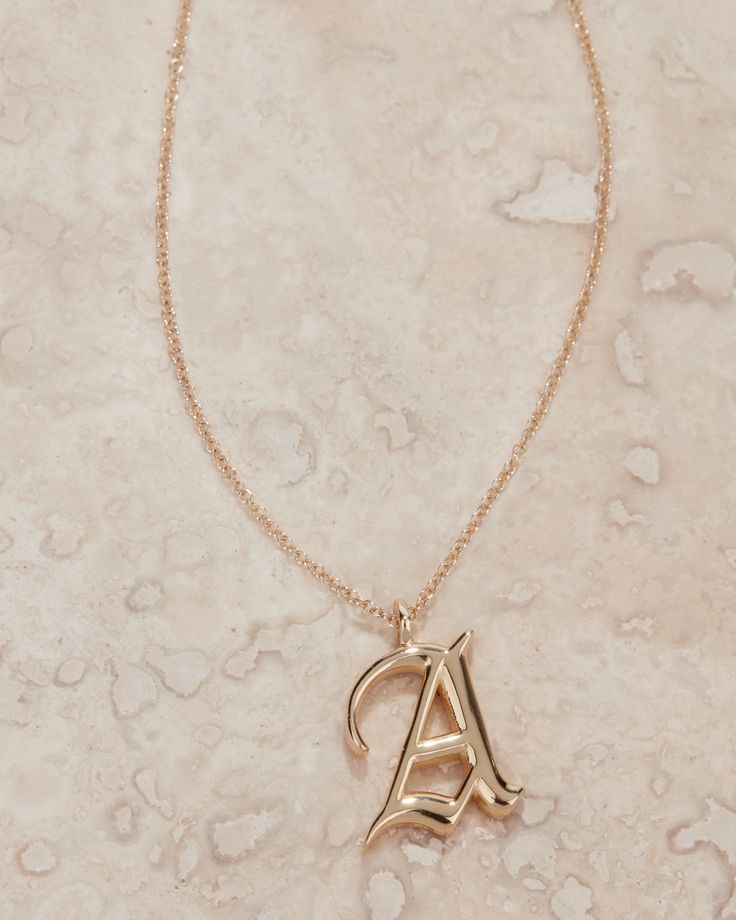 Meet the Luv Aj Fine Initial Charm Necklace. Available in Sterling Silver or 14K Gold, this classic piece is perfect to customize for yourself or a gift for a friend. This necklace is available in two fonts to really make it your own xx Classic Initial Necklace As A Gift, Classic Formal Name Necklace With Initials, Luxury 14k Gold Initial Necklace For Formal Occasions, Classic Personalized Initial Pendant Jewelry, Classic Initial Necklace As Personalized Gift, Luxury Personalized Initial Necklace, Classic Formal Initial Necklace, Classic Initial Pendant Necklace, Classic Necklaces With Initial Pendant For Anniversary