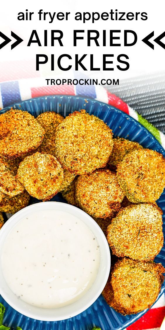 air fried pickles on a blue plate with ranch dip and lettuce leaves