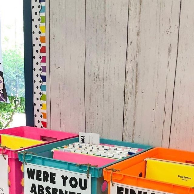 there are three bins that have writing on them