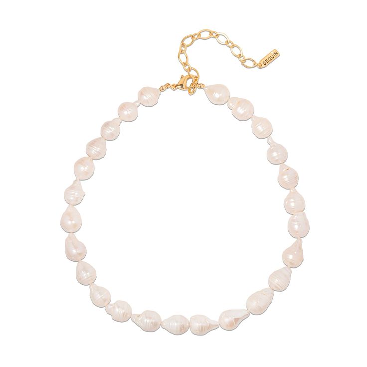 The Lucia Pearl Necklace highlights the baroque pearl’s radiant beauty and organic form. Equally chic as a standalone hero or layered with other chains, this choker will be a cherished piece for any jewelry box. Luxury White Pearl Choker Necklace, Baroque Pearl Choker Necklace In Pearl White, Pearl White Baroque Pearl Choker Necklace, Baroque Pearl White Choker Necklace, Baroque Pearl Choker Necklace With Pearl Charm, Luxury Pearl Choker Necklace, Luxury Pearl Chain Choker Necklace, Chic Pearl White Choker Jewelry, Chic Single Strand Pearl Jewelry