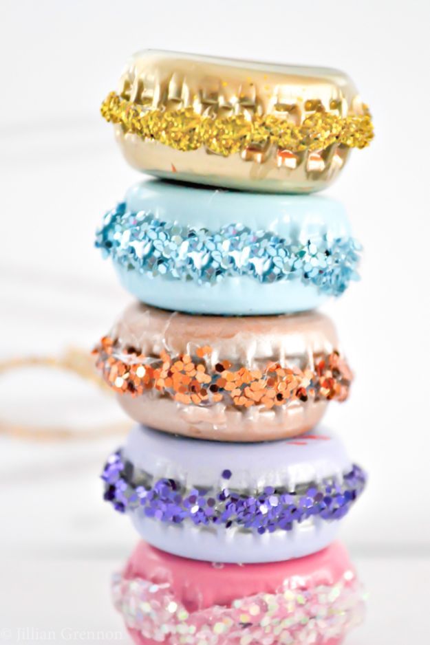 french macaron ornaments are stacked on top of each other in different colors