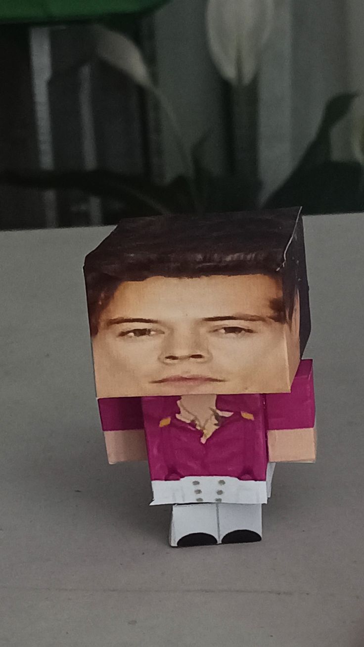 an image of a paper doll that looks like a man