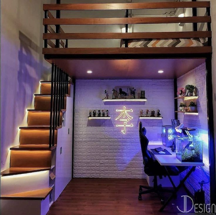 a room with some stairs and a desk in it