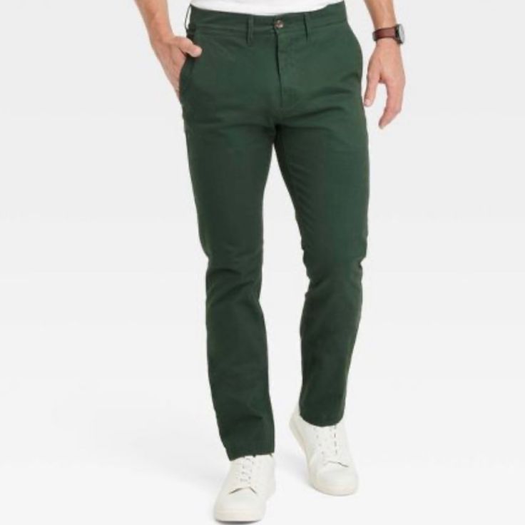 J. Crew Men's Straight Leg Chino With The Benefit Of The Stretch In The Fabric For All Day Comfort. The Fit Is Still Very Versatile And They Wear Well With Dress Shoes And A Blazer Or Sneakers And A T-Shirt. These Will Quickly Become A Favorite In Your Closet. These Pants Wear Well In And Out Of The Office. 34x34 Green Tapered Leg Cotton Dress Pants, Green Straight Chinos For Casual Wear, Casual Green Straight Chinos, Casual Green Tapered Leg Chinos, Casual Straight Tapered Pants, Casual Green Straight Leg Dress Pants, Fitted Green Chinos With Welt Pockets, Casual Slim Fit Flat Front Dress Pants, Casual Slim Fit Dress Pants With Flat Front