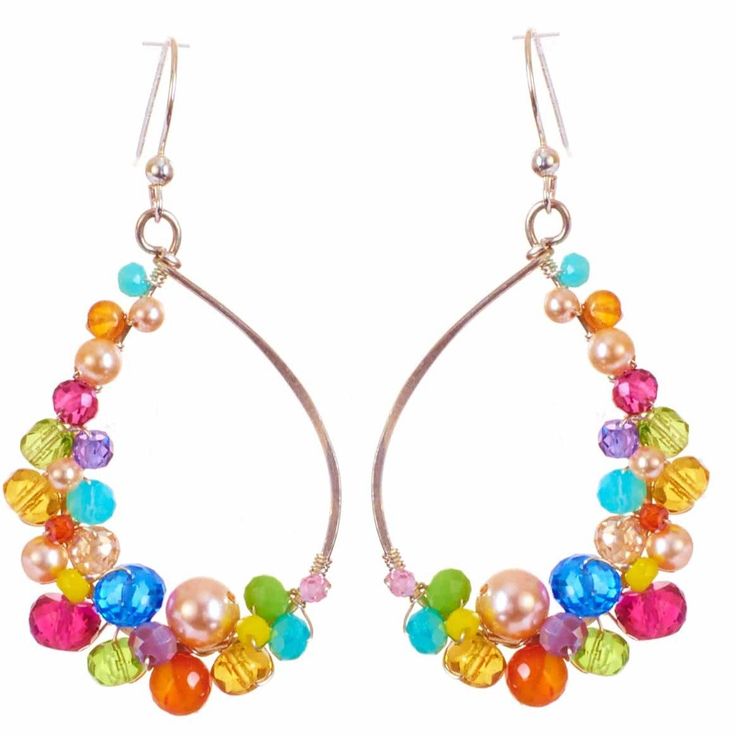 Anna always keeps you impressed and guessing with her creativity and edge. Our classic Anna earrings refreshed featured the movement of sculptural gemstones in a rainbow of colors atop the timeless hoop. Enjoy her everyday, for special occasions and everything in between. Length: 2″