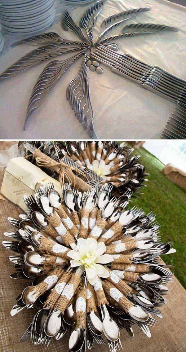 there are many forks and spoons arranged in the shape of a flower on top of each other