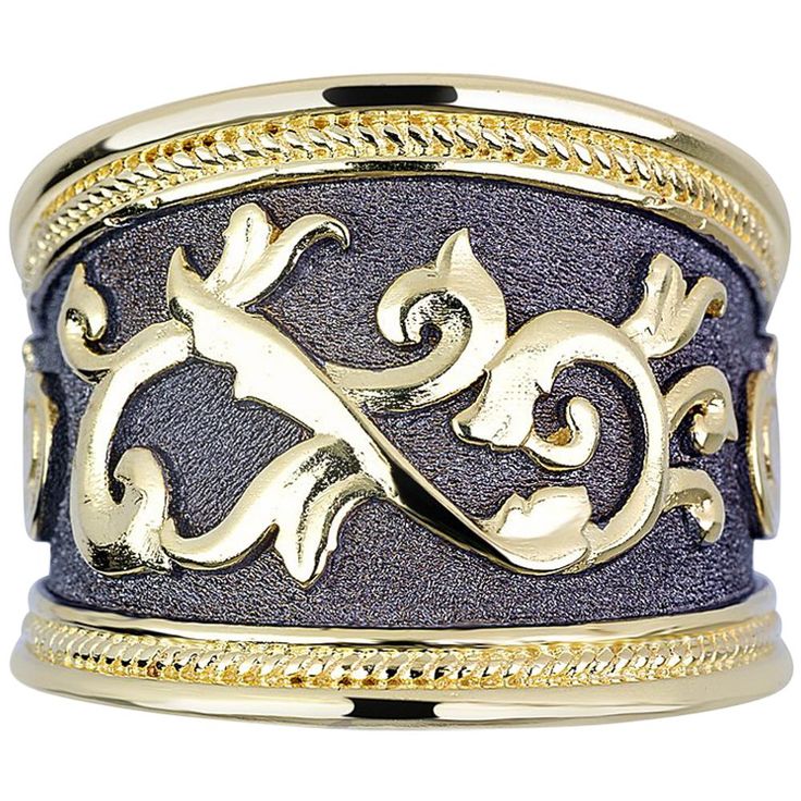 S.Georgios designer ring is all handmade from solid 18 Karat Yellow Gold and custom-made. The stunning ring is microscopically decorated with gold motives and granulated details contrast with a unique Byzantine velvet background finished in Black Rhodium. This gorgeous piece can be also ordered in all White, or Rose Gold, please contact us for more details. The ring is outstanding in quality of workmanship and stone collection and is made in our workshop in Athens Greece. Front Width: 17,0 mm Ba Velvet Background, Microscopes, Stone Collection, Unisex Ring, Black Rhodium, Athens Greece, All White, Black Rings, Cocktail Rings