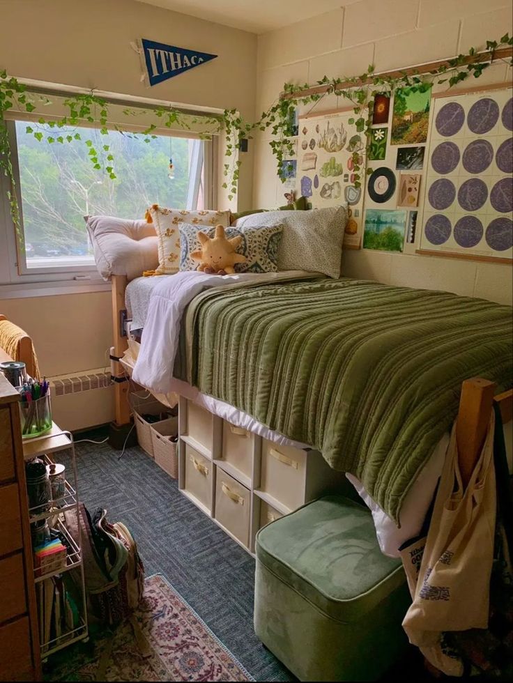 a bed room with a neatly made bed and lots of storage boxes on the floor