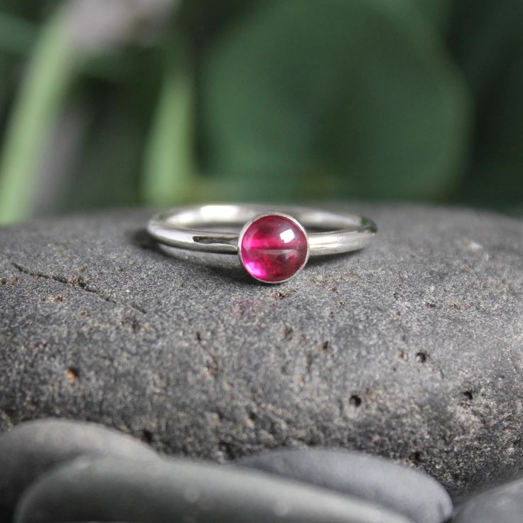 Sterling Silver Hot Pink Ruby Stacking Ring – AccentYourself Fine Jewelry Red Birthstone Stackable Rings, Red Birthstone Stackable Rings Fine Jewelry, Classic Red Birthstone Stackable Rings, Sterling Silver Stackable Rings With Bezel Setting As Gift, Red Birthstone Stackable Rings, Red Gemstone Sterling Silver Stackable Rings, Red Gemstone Stackable Rings In Sterling Silver, Red Stackable Rings With Bezel Setting As Gift, Stackable Ruby Birthstone Rings With Round Band