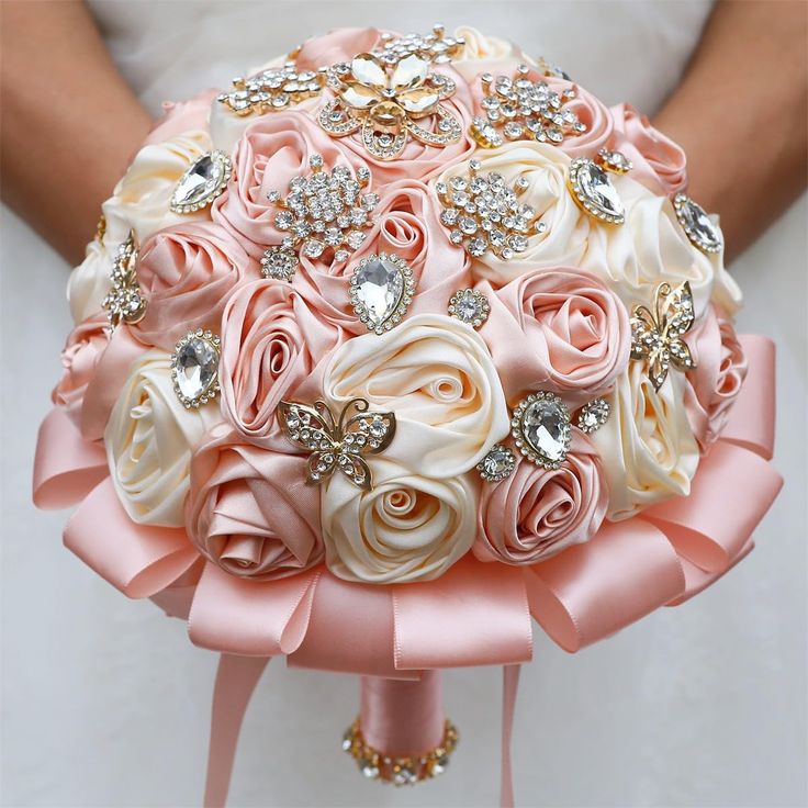 a bridal bouquet with pink and white flowers