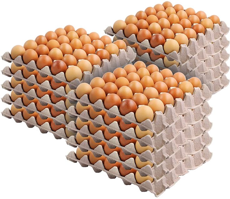 two cartons filled with eggs sitting next to each other on top of one another