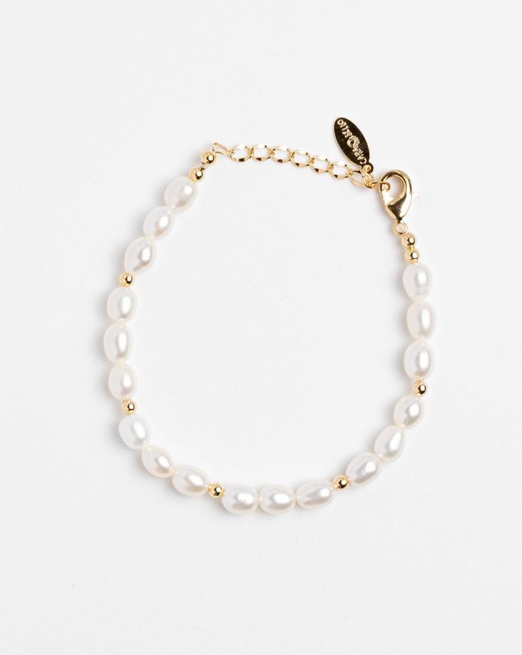 Handmade bracelet. Fresh water pearl with gold-plated round charms. Length: 6" with 1" adjustable chain. Made in USA. Bracelets Pearl, Simple Pearl, Wear Necklaces, Fresh Water Pearls, Fresh Water Pearl, Water Pearls, Anklet Bracelet, Delicate Jewelry, Pearl Gemstone