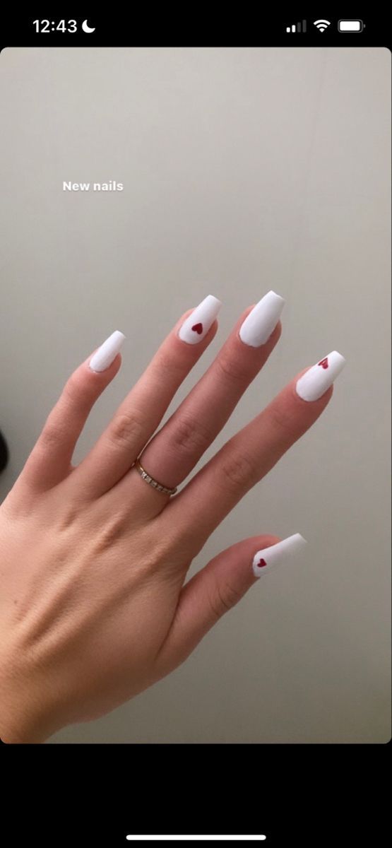 White Square Nails With Red Heart, White With Hearts Nails, White Nails With Purple Heart, Nail Art White Base, White And Red Heart Nails, White Nails With Heart On Ring Finger, White And Red Valentines Nails, Red Nails White Heart, White Nails With Red Heart