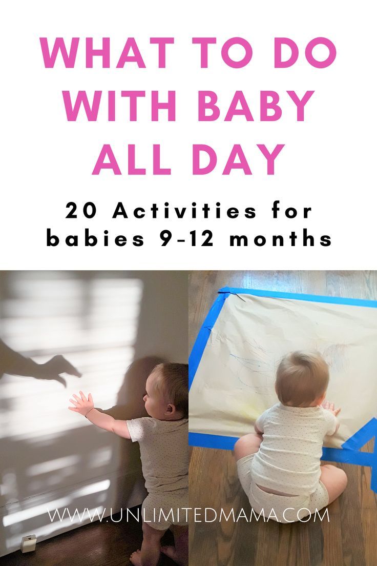 the baby is playing with his hands while sitting in front of an infant's play mat