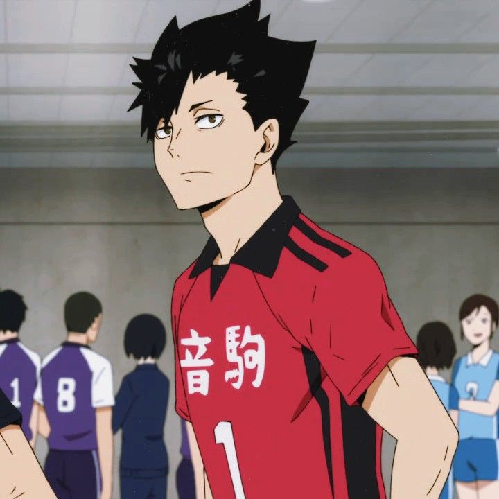 an anime character with black hair wearing a red shirt in front of other people and looking at the camera