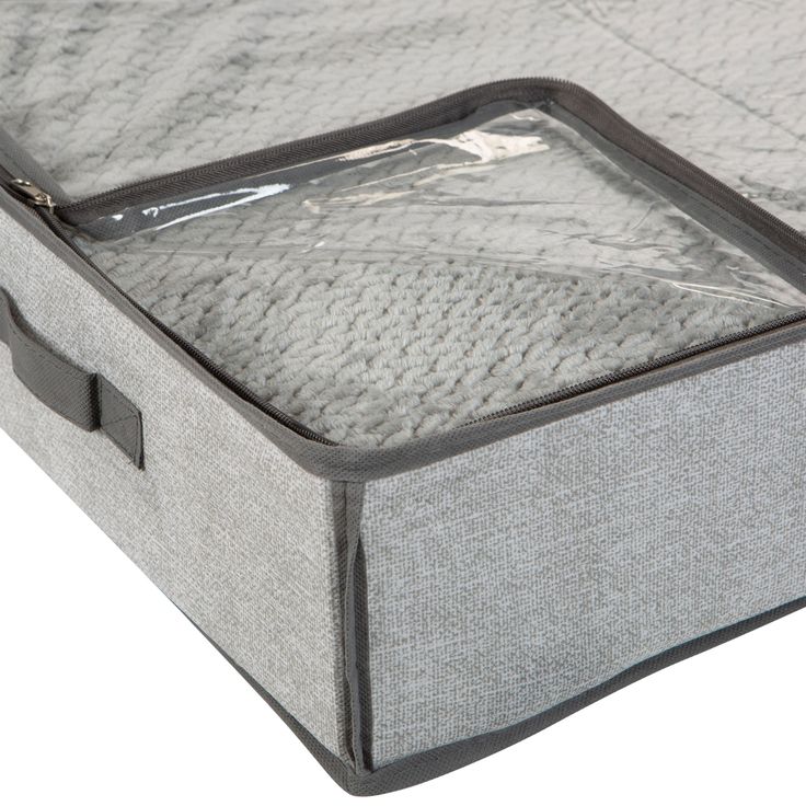 the bottom section of a mattress with zippered closures is shown in grey and white