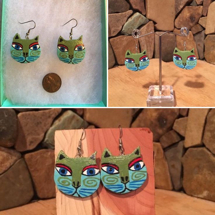 three different pictures of earrings with cats on them, one is green and the other is blue