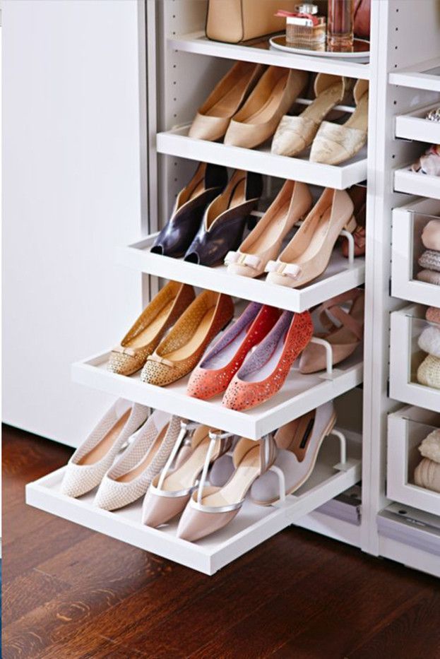 there are many pairs of shoes in the closet