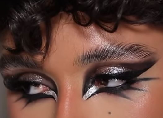 Magician Makeup Female, Dramatic Stage Makeup, Simple Drag Makeup Looks, Abstract Hair Painting, Drag Makeup On Women, Drag Makeup Hooded Eyes, Drag Eyeshadow Looks, Gothic Drag Makeup, Sparkly Goth Makeup