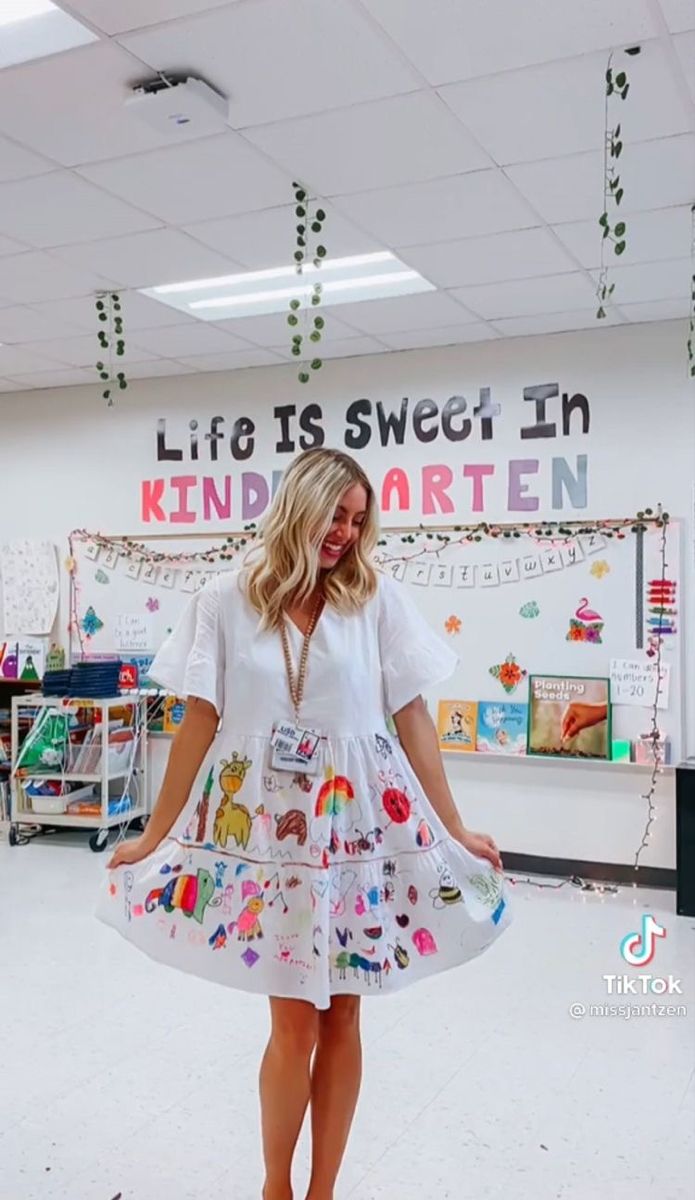 a woman standing in front of a sign that says life is sweet in kind of art