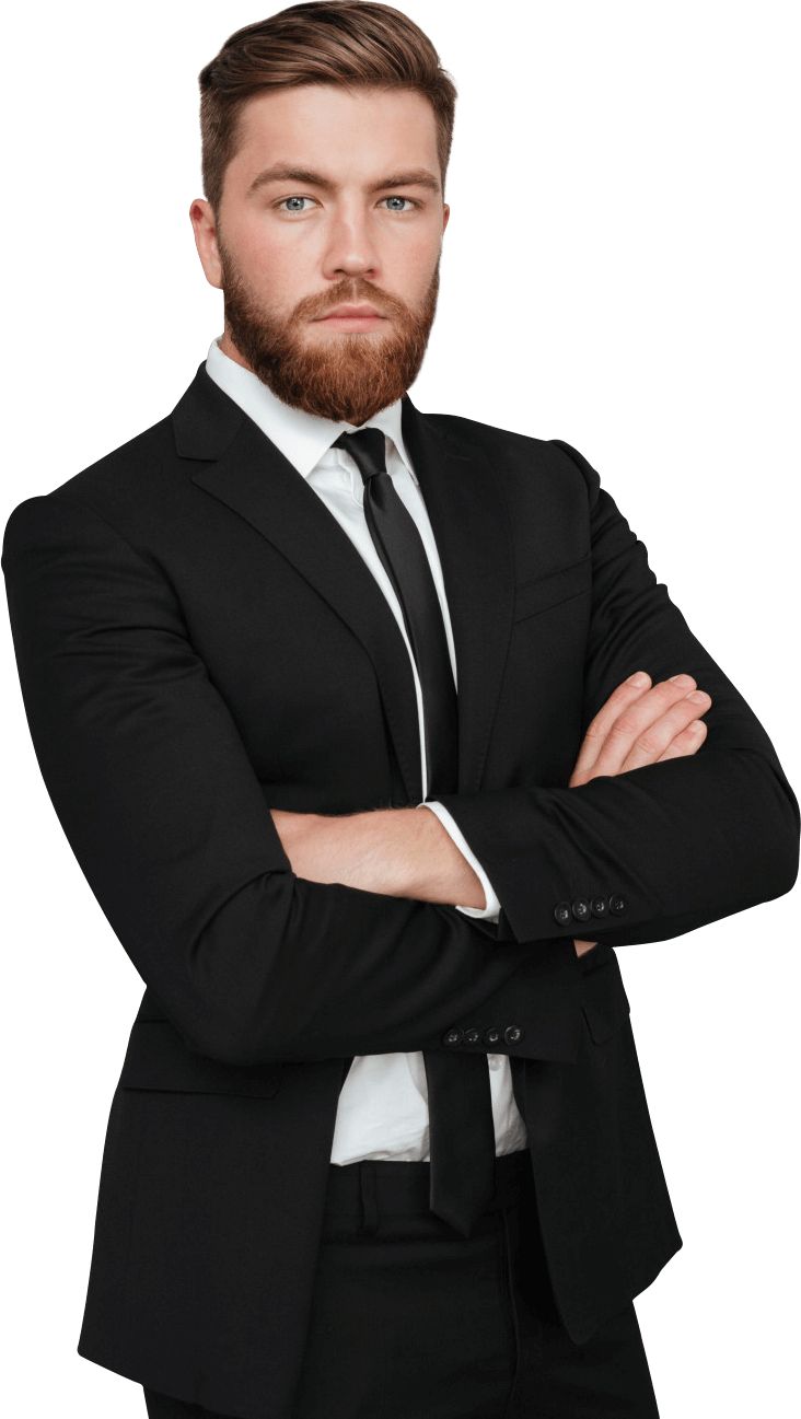 a man in a suit and tie with his arms crossed